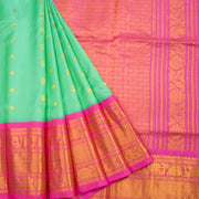 Gadwal Kuttu Weave Handloom Silk Saree in Pale Teal Green with Lotus Pink Zari Border and Pallu 10062955