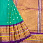 Gadwal Kuttu Weave Handloom Silk Saree in Jade Green with Royal Violet Peacock Border 10062952