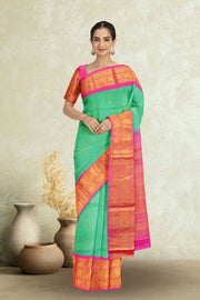 Gadwal Kuttu Weave Handloom Silk Saree in Pale Teal Green with Lotus Pink Zari Border and Pallu 10062955