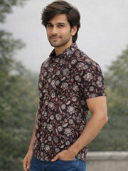 Man wearing a patterned Jahota Printed Cotton shirt with a blurred natural background