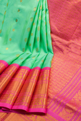 Gadwal Kuttu Weave Handloom Silk Saree in Pale Teal Green with Lotus Pink Zari Border and Pallu 10062955