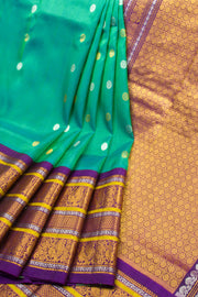 Gadwal Kuttu Weave Handloom Silk Saree in Jade Green with Royal Violet Peacock Border 10062952