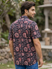 Man wearing a floral patterned Jahota Printed Cotton shirt outdoors