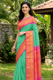 Teal Green Gadwal Kuttu Handloom Silk Saree With Pink Zari Border 10077202