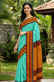 Teal Blue Handloom Gadwal Kuttu Silk Cotton Saree With Temple Border 10077206