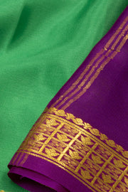 Evergreen Charm Green Mysore Crepe Silk Saree With Zari Border 10076676