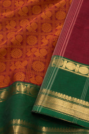 Rustic Maroon Handloom Kanchi Cotton Saree with Peacock Motifs And Rudhraksham Zari Border 10076469