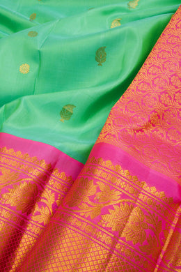 Gadwal Kuttu Weave Handloom Silk Saree in Pale Teal Green with Lotus Pink Zari Border and Pallu 10062955