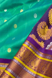 Gadwal Kuttu Weave Handloom Silk Saree in Jade Green with Royal Violet Peacock Border 10062952