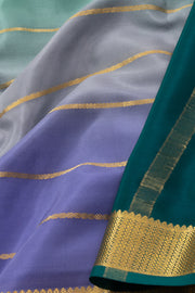 Ombre Dye Mysore Crepe Silk Saree In Green and Purple With Zari Stripes and Zari Border 10076257