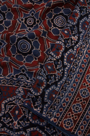 Ash Navy Blue Ajrakh Printed Mulmul Cotton Saree With Floral Motifs And Floral Border 10076522