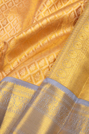 Harvest Sun Gold Kanjivaram Tissue Silk Saree With Geometric Design And Peacock Border 10076699