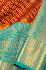 Cherry Brick Maroon Kanjivaram Pure Silk Saree With Golden Zari Leaf Butta Design And Peacock Border 10076716