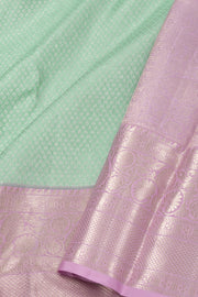 Sea Mist Green Kanjivaram Pure Silk Saree With Silver Zari Floral Butta Design And Floral Border 10076729