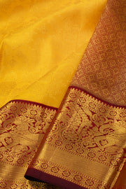 Sunkissed Gold Yellow Kanjivaram Pure Silk Saree With Contrast Royal Wine Maroon Border And Blouse 10076732