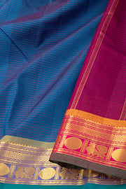 Midnight Ocean Blue Kanjivaram Pure Silk Saree With Stripes Design And Peacock Border 10076747