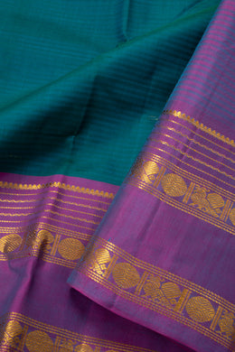 Ocean Depth Blue Kanjivaram Pure Silk Saree With Stripes Design And Thandavalam Border 10076758