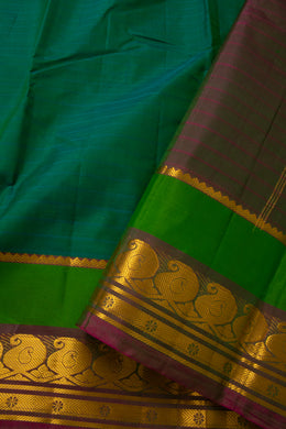 Evergreen Teal Green Kanjivaram Pure Silk Saree With Stripes Design And Thandavalam Border 10076772