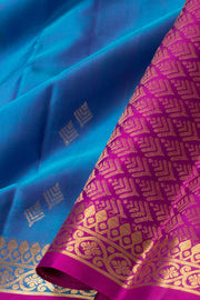 Deep Sky Blue Handloom Kanjivaram Soft Silk Saree With Geometric Butta Design And Floral Border 10076785