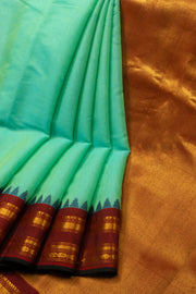 Teal Blue Handloom Gadwal Kuttu Silk Cotton Saree With Temple Border 10077206