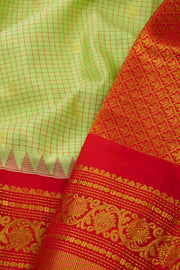 Green Gadwal Kuttu Silk Saree 10075417