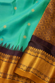 Green Gadwal Kuttu Silk Saree 10076206