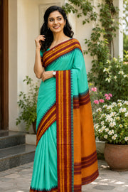 Teal Blue Handloom Gadwal Kuttu Silk Cotton Saree With Temple Border 10077206