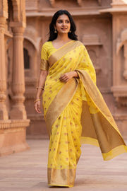 Honey Glow Yellow Banarasi Handloom Muga Silk Saree in Lemon Yellow with Meenakari Floral Buttis 10074271