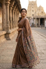 Brown Kalamkari Printed Semi Tussar Silk Saree With Floral Motifs And Floral Border 10076273