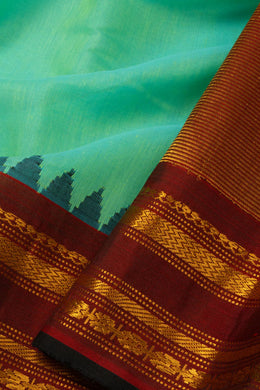 Teal Blue Handloom Gadwal Kuttu Silk Cotton Saree With Temple Border 10077206