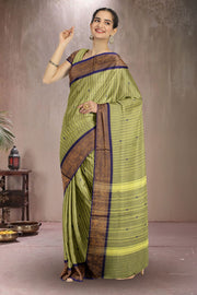 Pistachio Green Chettinad Cotton Saree with Stripes and Peacock Zari Border 10075911