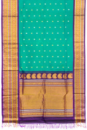 Teal Green Gadwal Kuttu Handloom Silk Saree With Violet Peacock Border 10077201