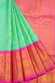 Teal Green Gadwal Kuttu Handloom Silk Saree With Pink Zari Border 10077202