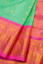 Gadwal Kuttu Weave Handloom Silk Saree in Pale Teal Green with Lotus Pink Zari Border and Pallu 10062955