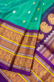Gadwal Kuttu Weave Handloom Silk Saree in Jade Green with Royal Violet Peacock Border 10062952
