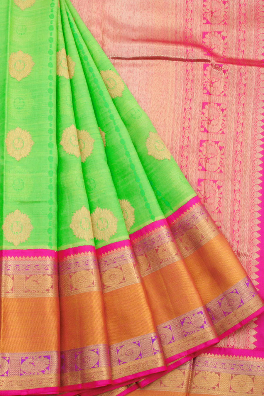 Bright green Handloom Pure Zari Korvai Kanjivaram Silk Saree with Mayil Chakram Motifs, Thandavalam Mayil Chakram Border and Peacock Paisley Pallu
