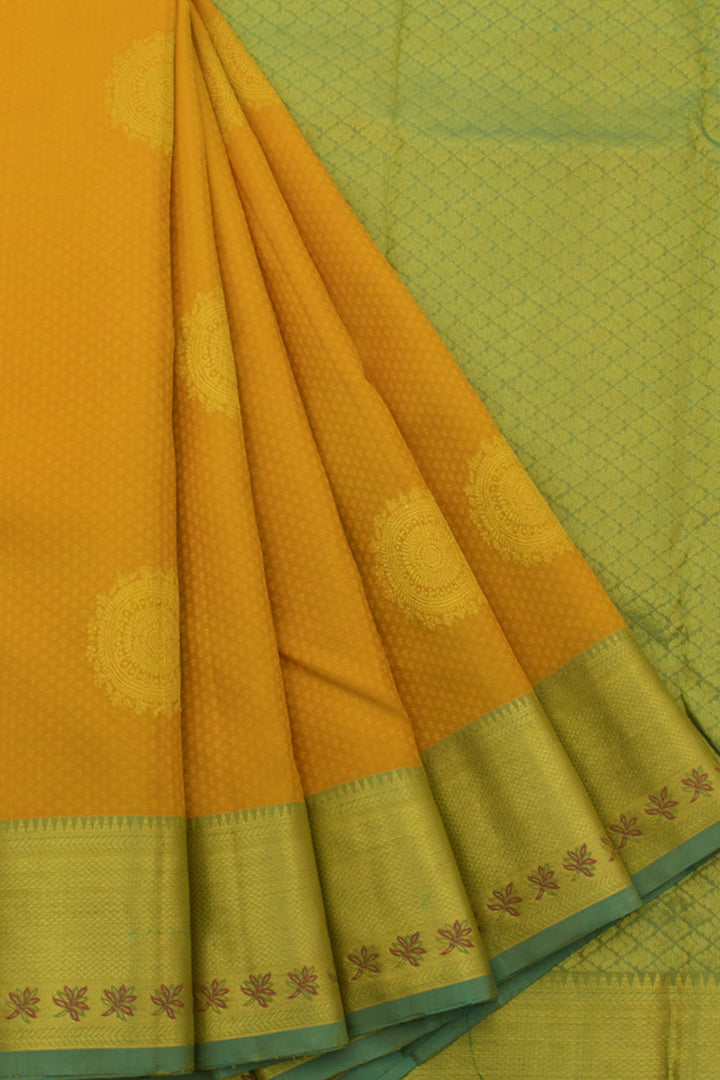 Handloom Pure Silk Jacquard Kanjivaram Saree with Chakram Motifs and Kuyil Kann Border