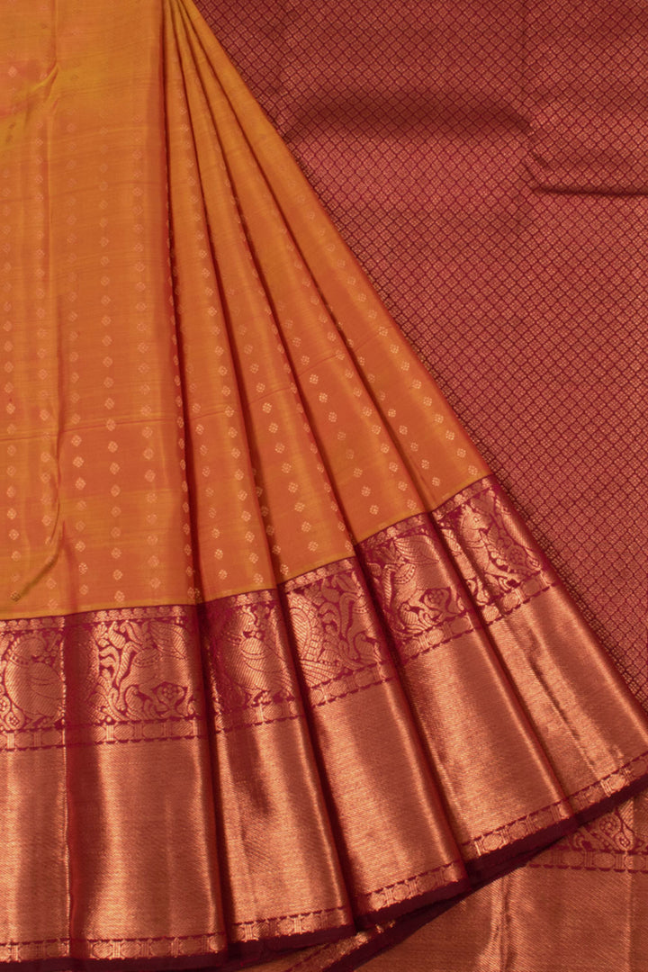 Handloom Pure Silk Kanjivaram Saree with Copper Coloured Floral Motifs and Peacock Bavanji Border