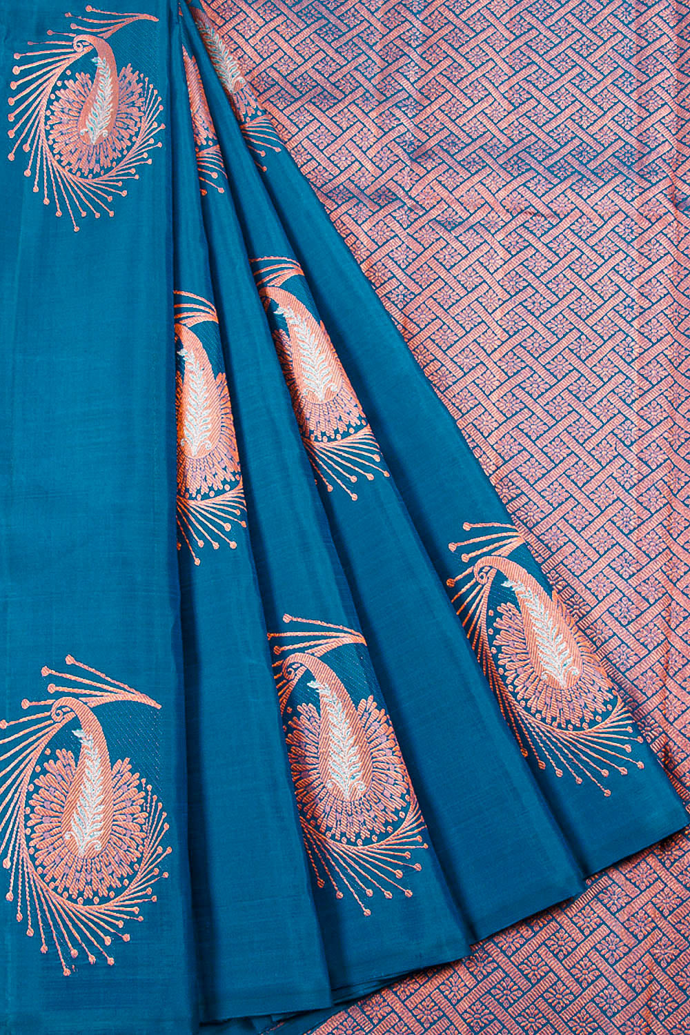 Handloom Borderless Kanjivaram Silk Saree with Copper tone Paisley Motifs and Trellis design Pallu