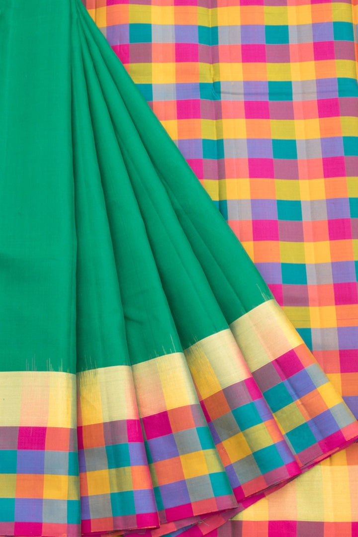 Dark green Pure Zari Kanjivaram Silk Saree with Multi Colour Checks Border and Multi Colour Checks Pallu 