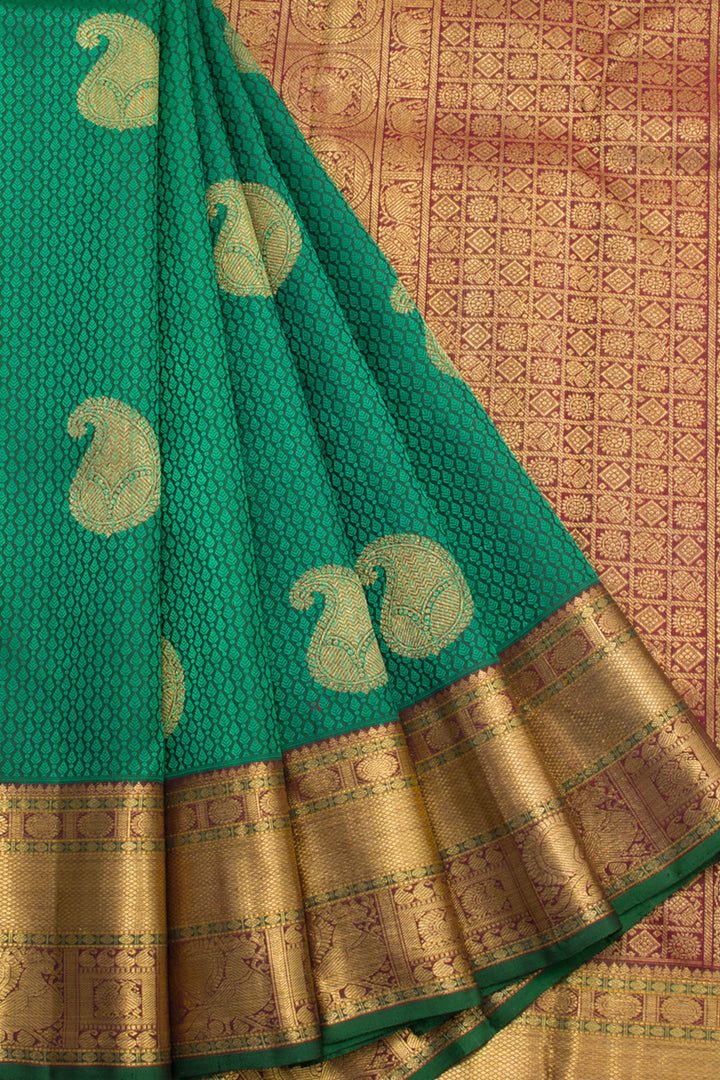 Bottle Green Handloom Kanjivaram Jacquard Silk Saree with Paisley Motif and Annam Border