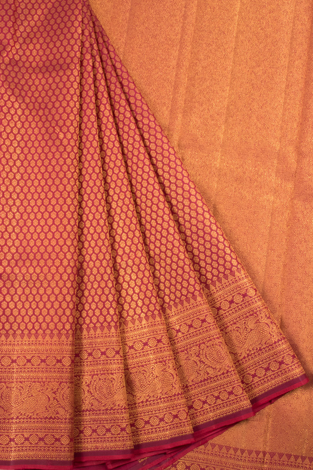 Handloom Pure Zari Maroon Kanjivaram Bridal Silk Saree with Floral Motifs, Peacock and Rudhraksham Motifs with Temple Border and Floral Motifs Pallu