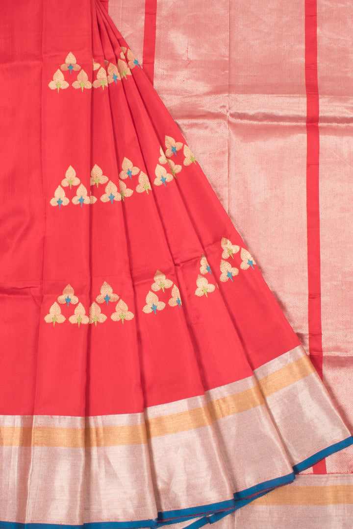 Handloom Banarasi Silk Saree with Floral Motifs and Zari Border 