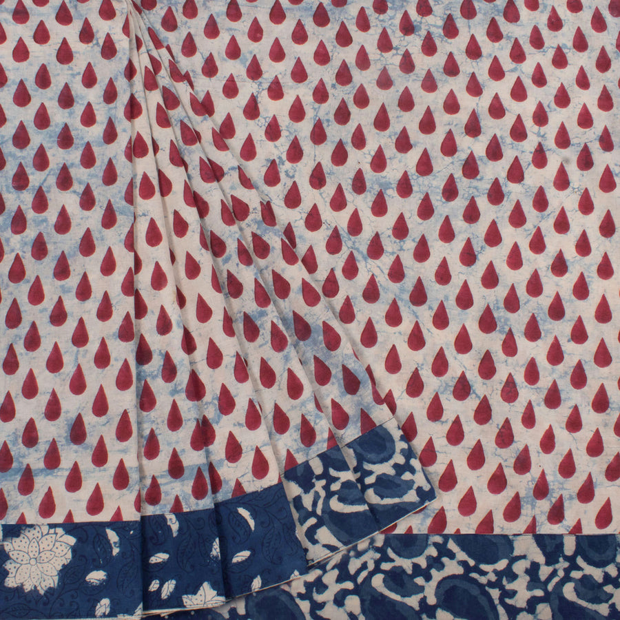 Hand Block Printed Mulmul Cotton Saree with Rain Drop Motifs, Dabu Printed Border and Fancy Bird Tassels