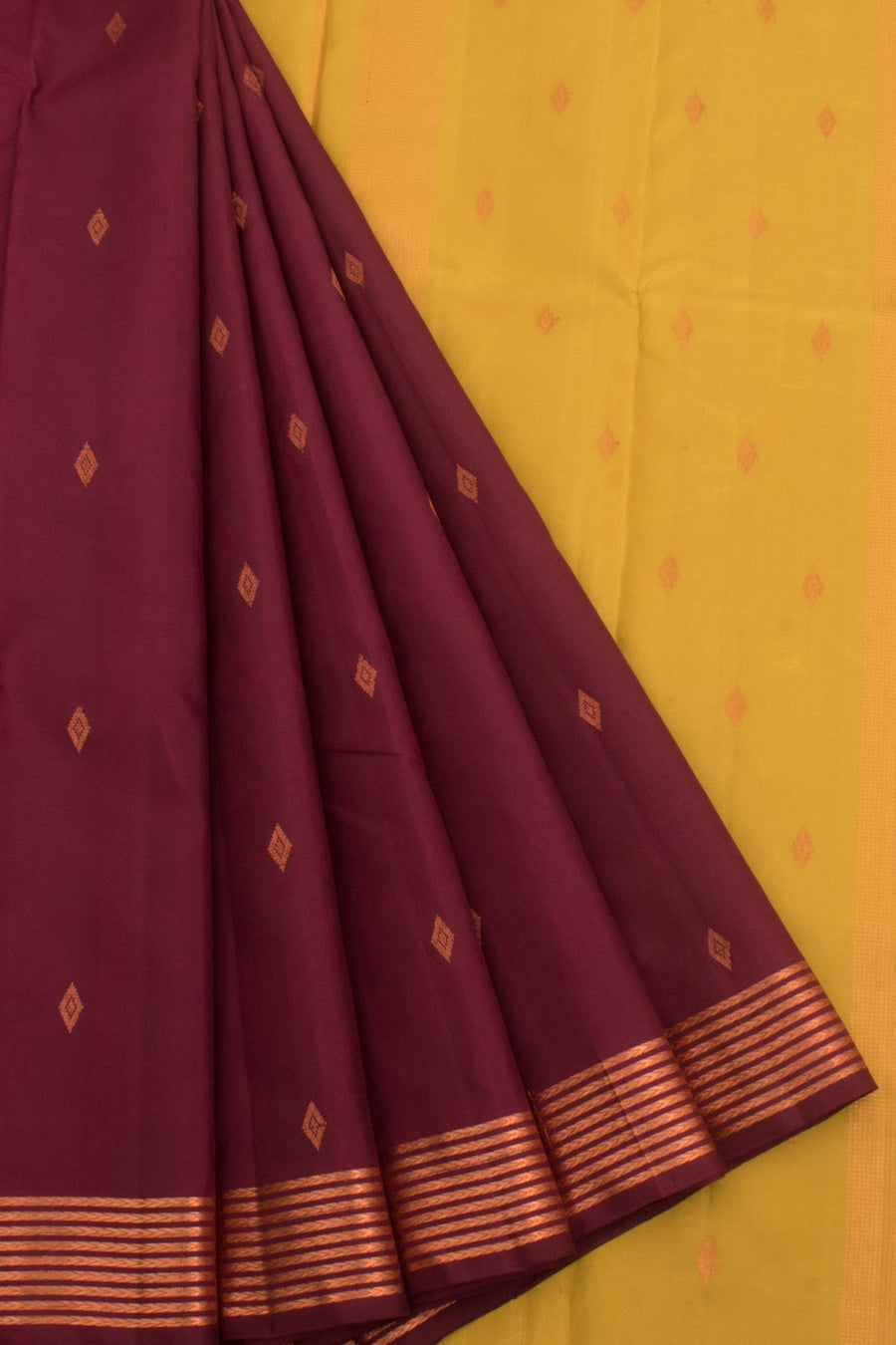 Handloom Pure Zari Kanjivaram Silk Saree with Copper Coloured Diamond Motifs and Border 