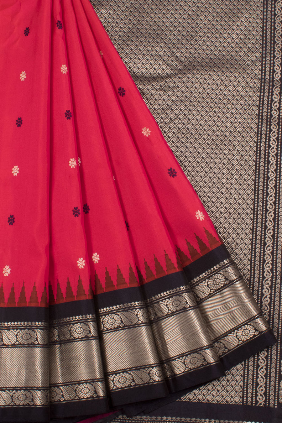Handloom Gadwal Kuttu Silk Saree with all over Floral Motifs and Silver Zari Paisley Border, Pallu