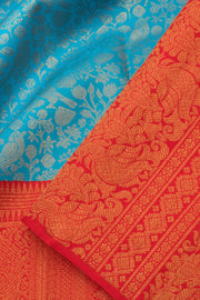 Ananda Blue Korvai Kanjivaram Pure Zari Handloom Silk Saree with Kodi Paravai Pattern and Contrast Chilli Red Border 10058738