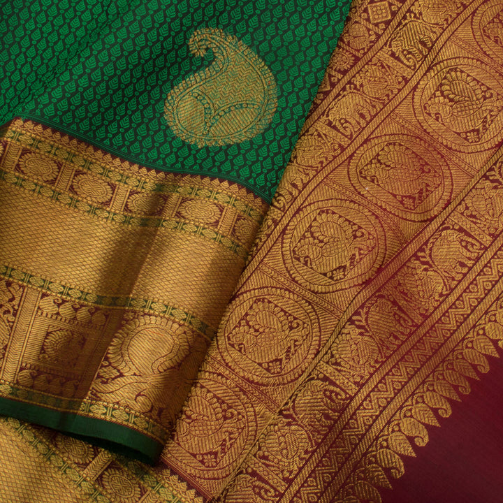 Handloom Pure Zari Jacquard Kanjivaram Silk Saree with Paisley Motifs and Peacock Diamond Border